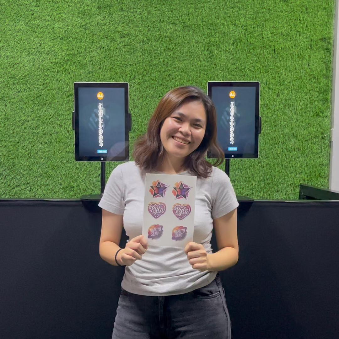 Guests creating their own AI Tattoos at exhibition in Dubai